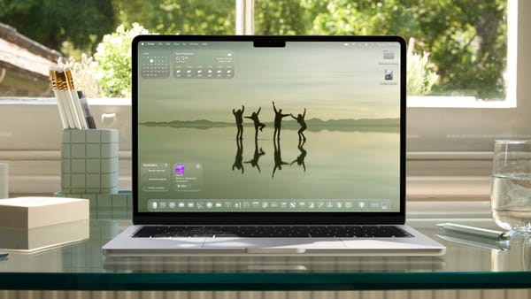 A Mac running macOS Tahoe with Liquid Glass